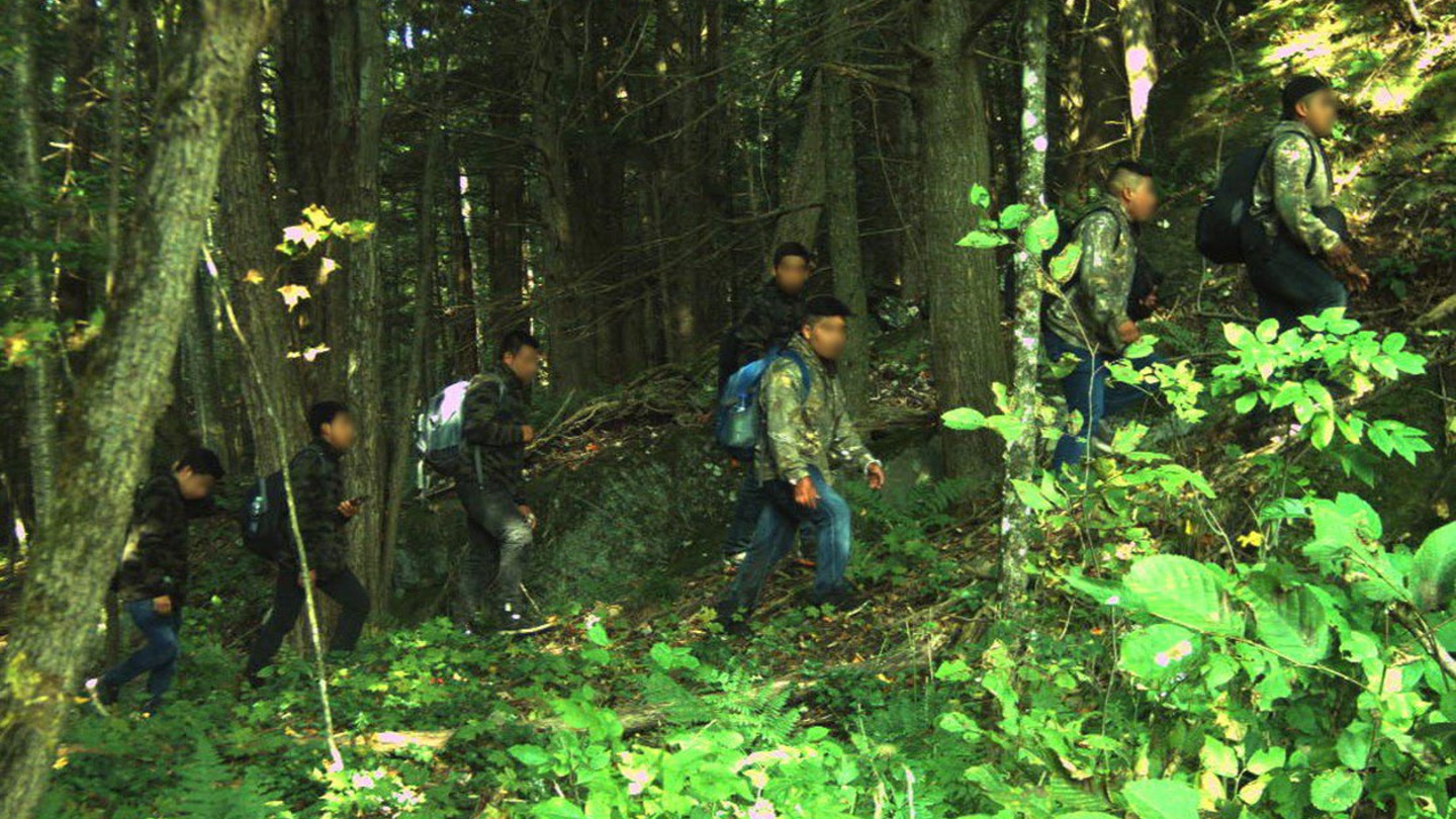 Illegal immigrants accused of pocketing thousands by smuggling hundreds of aliens each week from Canada to US