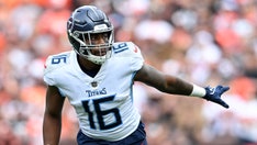 Titans' Treylon Burks carted off field after hitting head on field, lying motionless