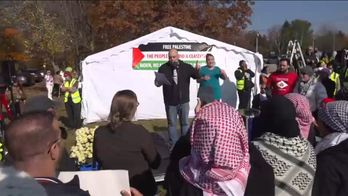 Hundreds of pro-Palestine protesters march to Biden's Delaware home as president returns from DC