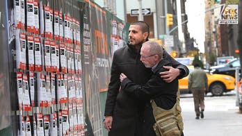 Woman vandalizes Israeli hostage posters right in front of captives' family members in New York City