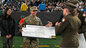 Soldiers in training receive over $1M in college scholarships from US military at NFL game
