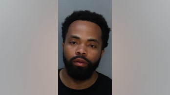 Miami police arrest fellow officer for DUI after he was found passed out in car with gun