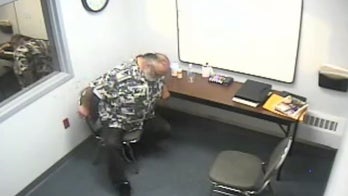 Murder suspect left alone in interrogation room lets bodily functions run wild: video