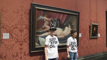 Climate activists take hammers to famous painting in London museum