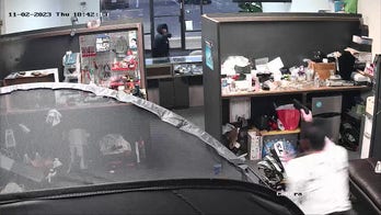 Armed Texas store owner defends self in shootout with would-be robbers, video shows