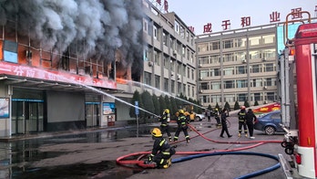 26 dead, 38 injured in fire at Chinese coal mining company building