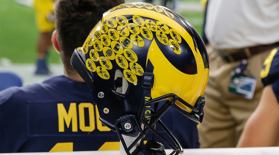 Michigan football debuts new helmet stickers telling a player's