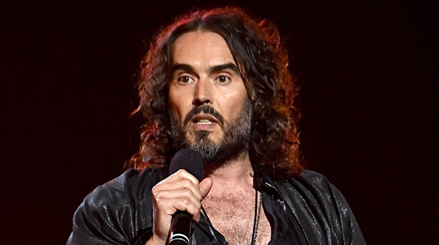 Russell Brand denies sexual assault allegations, blames media