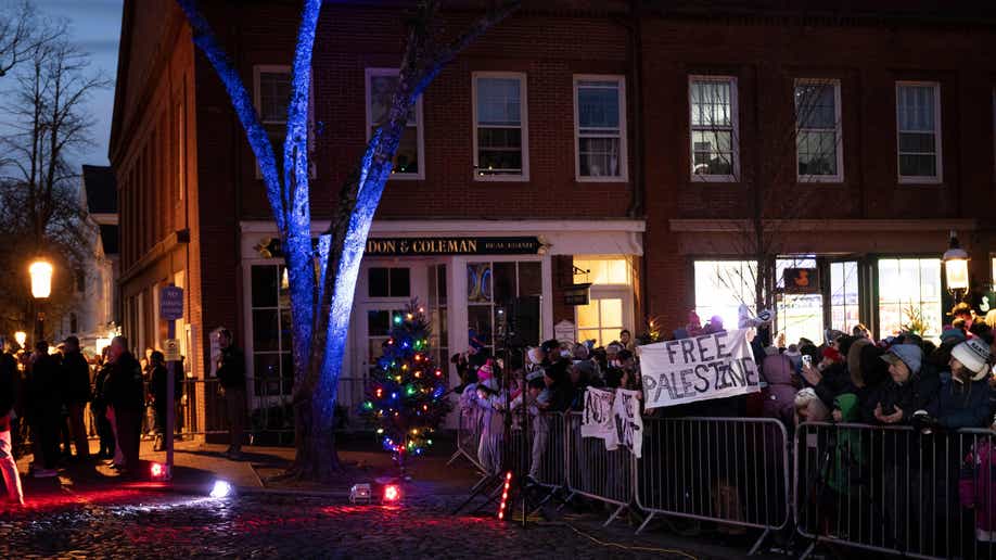 Protesters at Tree Lighting ceremony