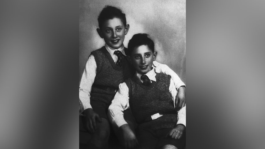 Henry Kissinger is shown with his brother Walter as children.