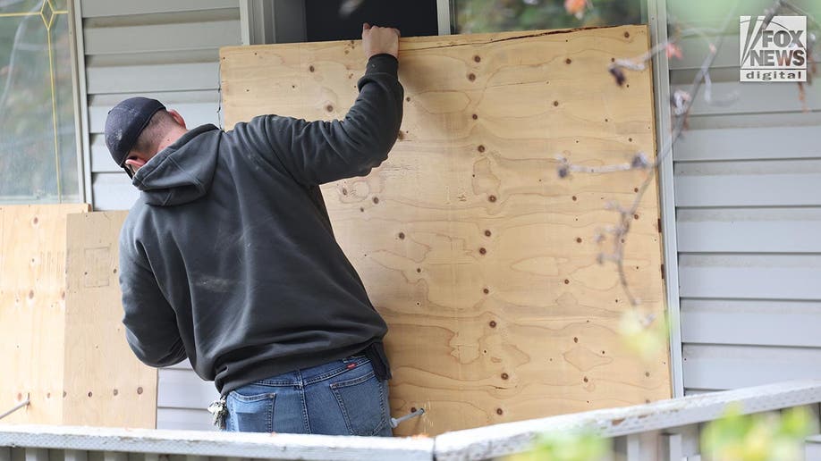 Investigators at the home of the slain University of Idaho students