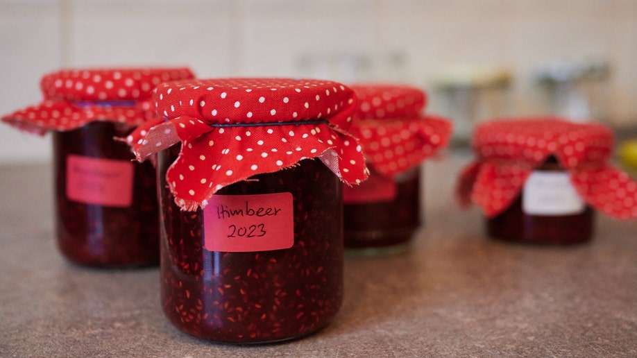 Jars with raspberry jam