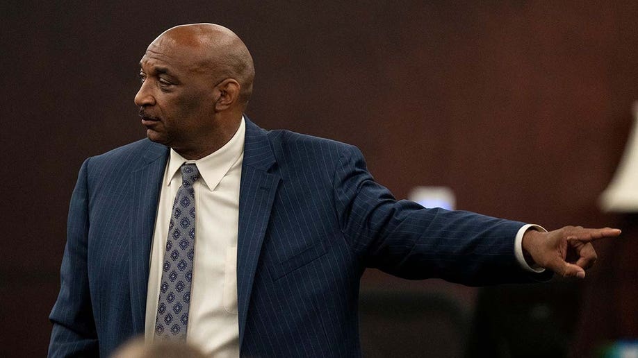 State attorney Rickey Jones points at defendant Kaitlin Armstrong during closing arguments
