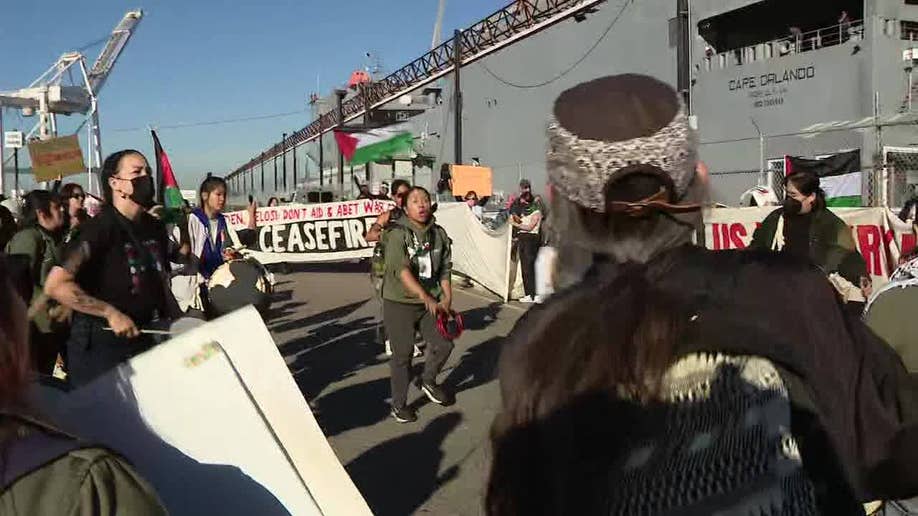 Protesters outside the U.S ship