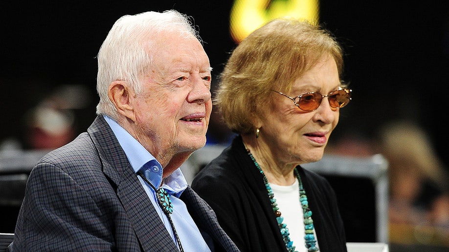 Former president Jimmy Carter and his wife Rosalynn prior to the game between the Atlanta Falcons and the Cincinnati Bengals