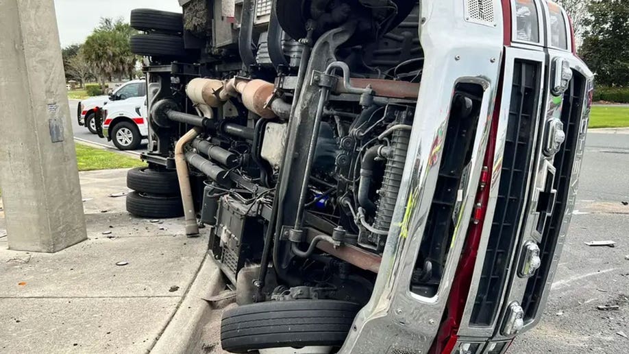 MCFR truck on sidewalk after crash