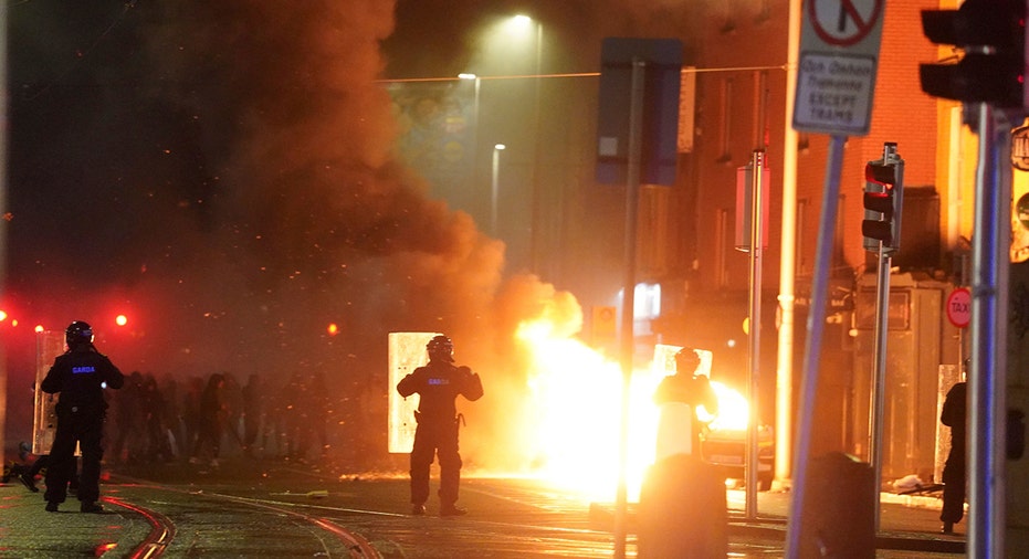 Car burns in Dublin, Ireland amid riots