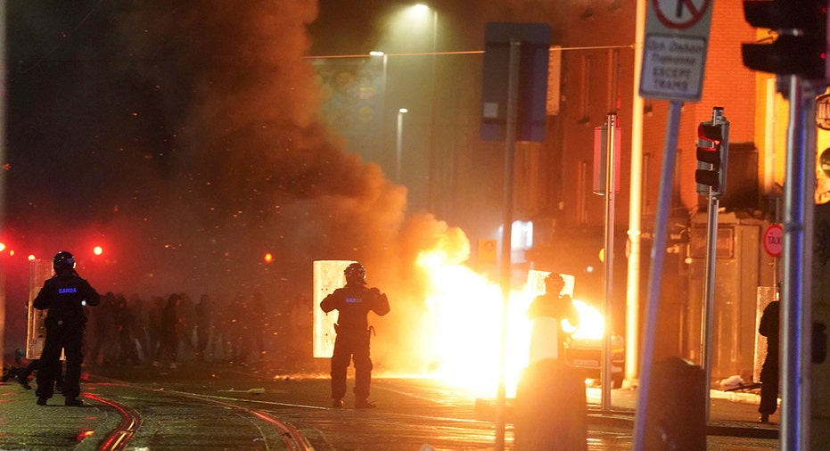 Car burns in Dublin, Ireland amid riots