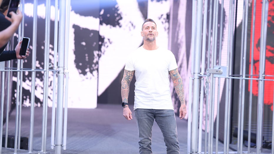 CM Punk addresses WWE fans in return to 'Monday Night Raw': 'I'm home'