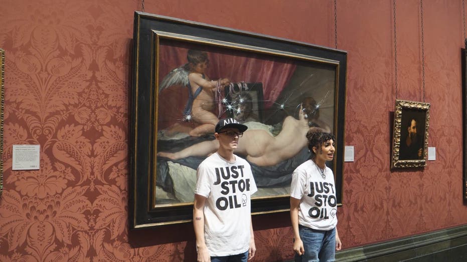 Climate activists take hammers to famous painting in London museum