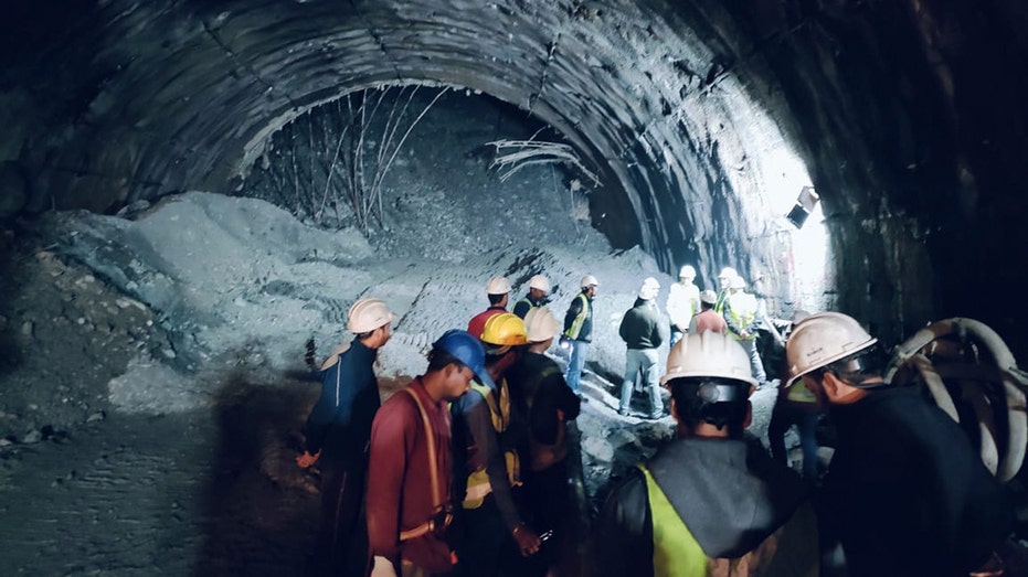 Indian rescuers locate 40 workers trapped inside collapsed tunnel by landslide