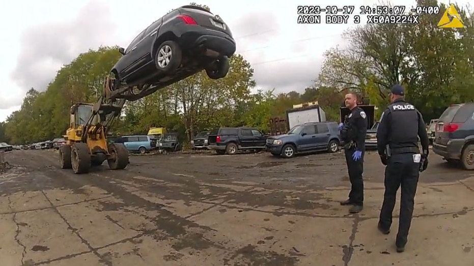 Ohio car theft suspect foiled by quick-thinking forklift operator who holds him 20 feet in the air