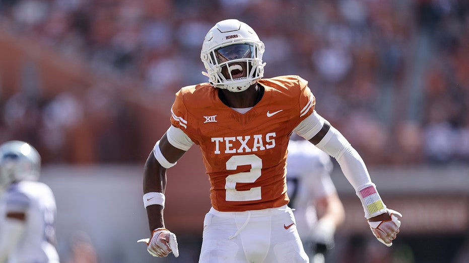 Texas avoids upset with overtime win over Kansas State