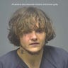 A mugshot of Dustin Sweet