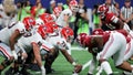 The Georgia Bulldogs prepares for play against the Alabama Crimson Tide defense during the third quarter in the SEC Championship at Mercedes-Benz Stadium on December 02, 2023 in Atlanta, Georgia.