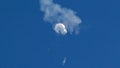 The suspected Chinese spy balloon drifts to the ocean after being shot down off the coast in Surfside Beach, South Carolina, U.S. February 4, 2023.