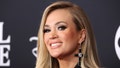 Carrie Underwood says the enjoys Christmas through the eyes of her sons, Isaiah, 8 and Jacob, 4.