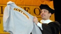 College of Saint Rose alumnus Jimmy Fallon displays a sweatshirt from his alma mater during a 2009 commencement speech at the school.