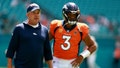 Head coach Sean Payton of the Denver Broncos talks to Russell Wilson #3 of the Denver Broncos prior to a game against the Miami Dolphins at Hard Rock Stadium on September 24, 2023 in Miami Gardens, Florida.