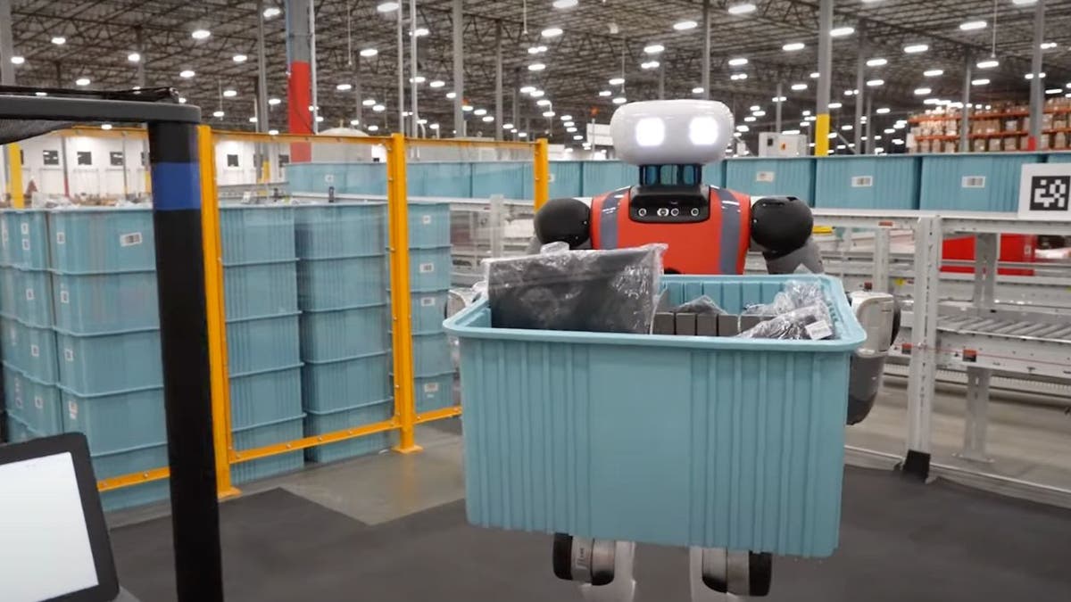 I've been inside 's new hi-tech warehouses – and I've seen how robots  will change how we work, The Independent