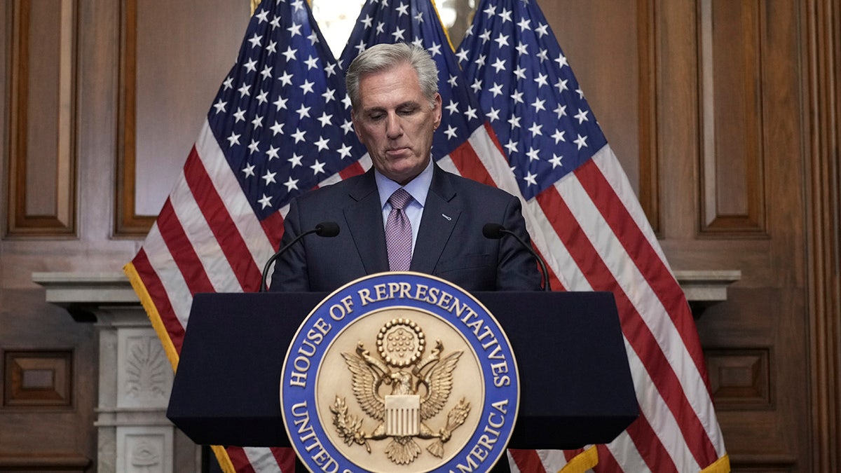 McCarthy at podium sulking