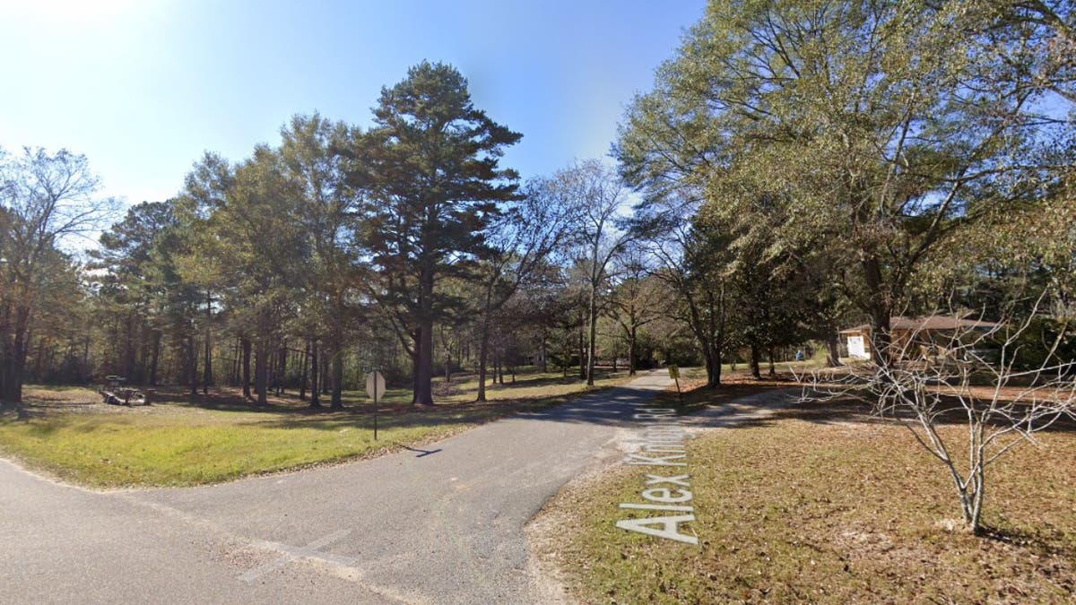 An image showing the entrance to Alex Knight Road in Ovett, Mississippi, where an 11-year-old boy died after being shot by his sister.