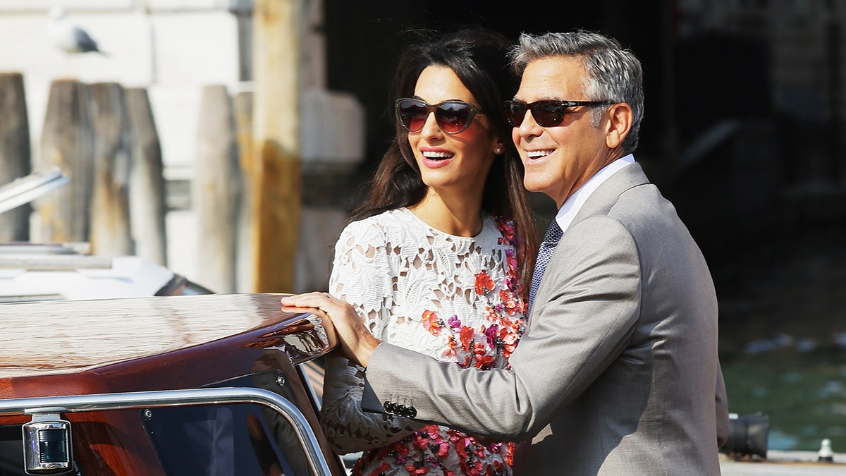 Amal Clooney rides on a boat with George Clooney