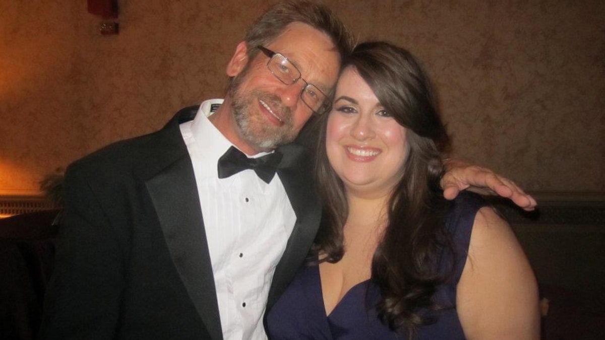 Thomas Randele in a suit and tux leaning against his smiling daughter Ashley Randele