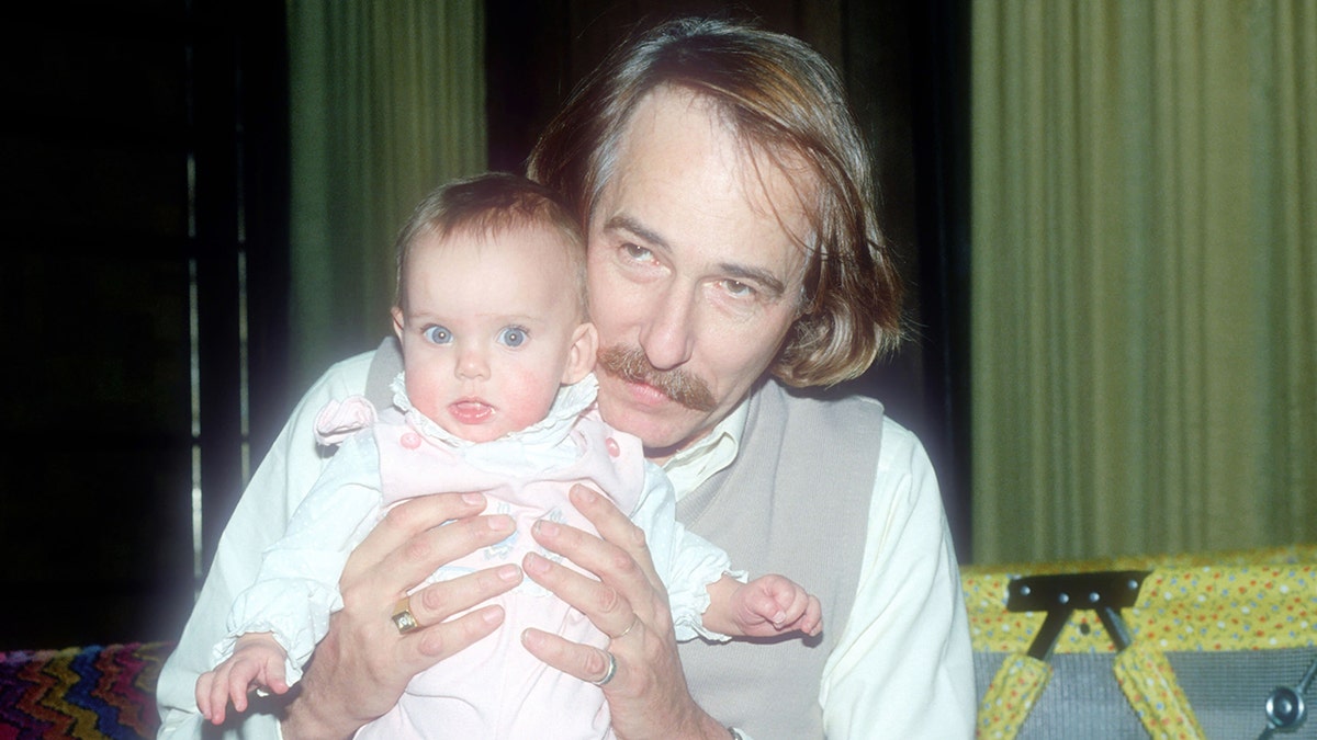 John Phillips holds Bijou