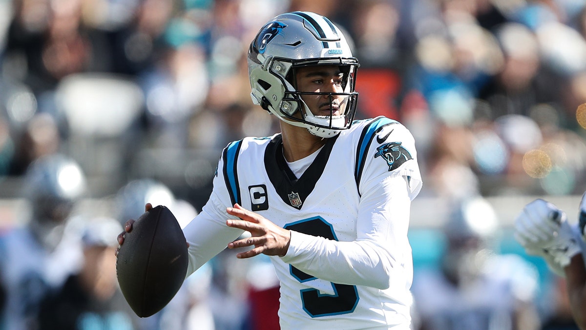 Panthers’ Bryce Young slams tablet on sideline as frustrations boil over in team’s 14th loss 2 Bryce Young looks to throw