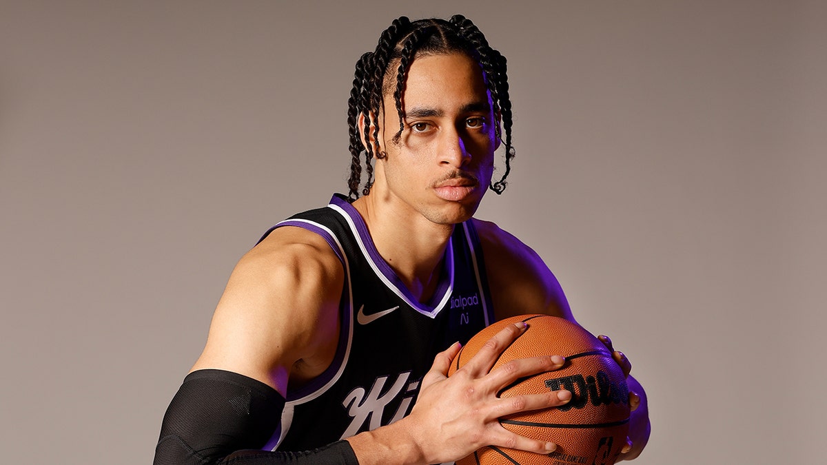 Chance Comanche poses with basketball