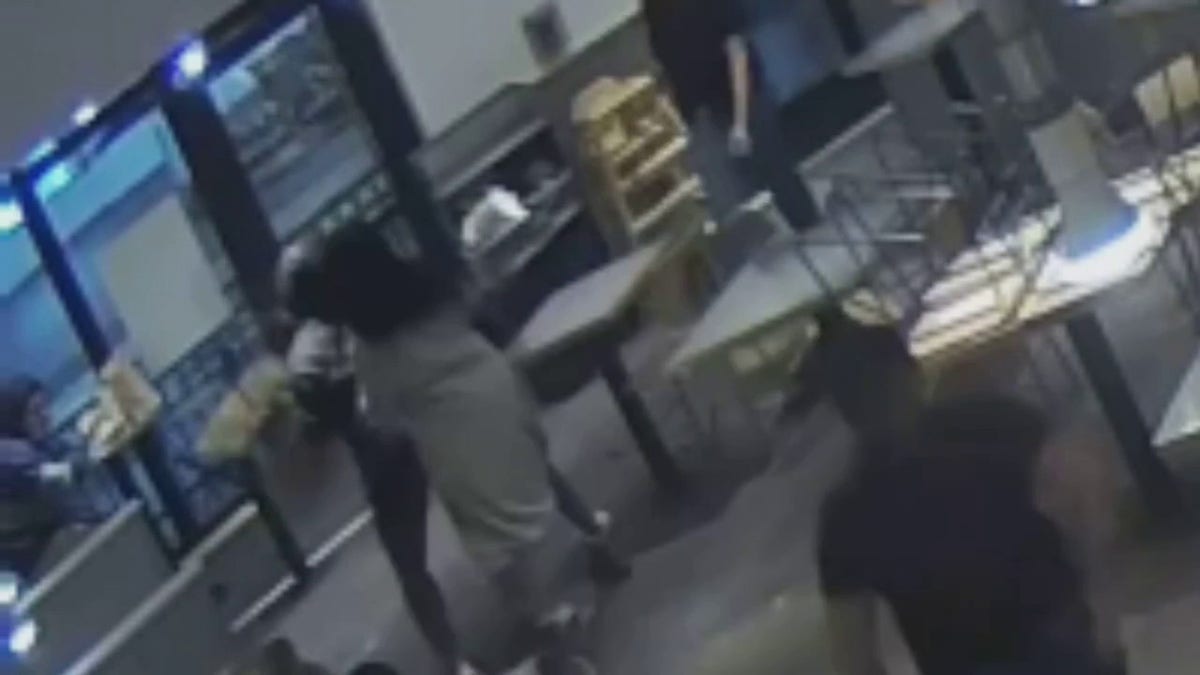 suspect throwing chair at employee