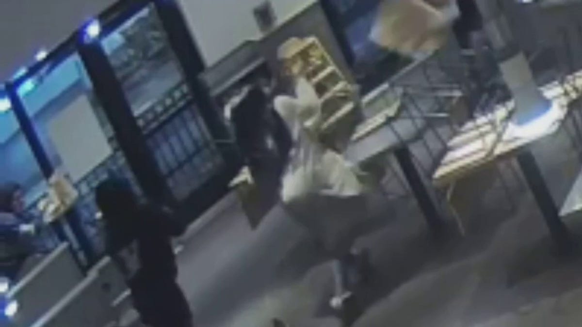 suspect throwing chair at employee