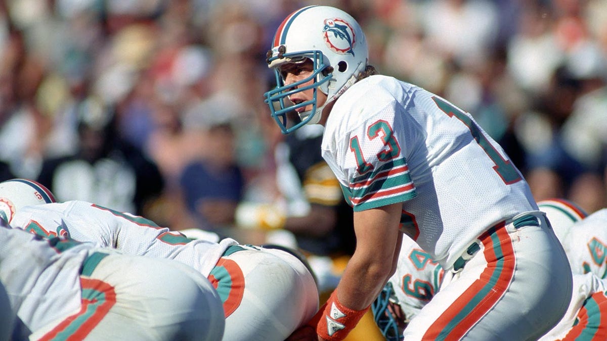 Daughter gifts father prized Dan Marino trading card years after