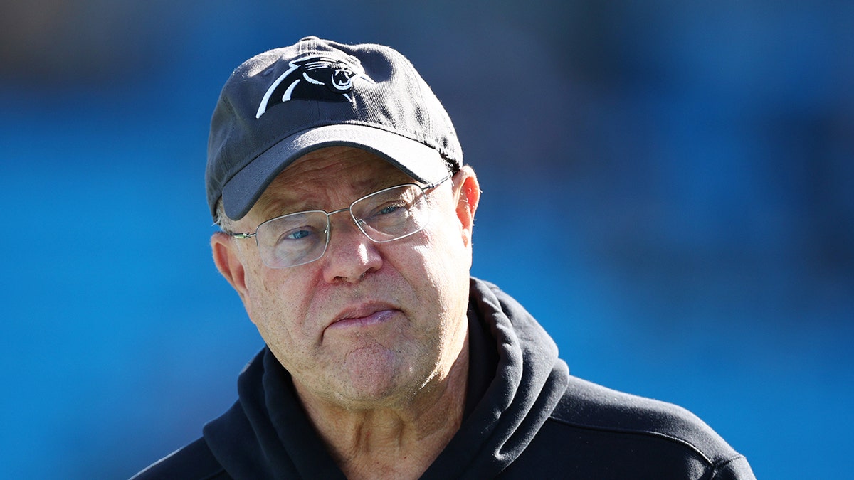 Panthers owner David Tepper appears to throw drink at Jaguars fan from suite 2 David Tepper looks on field