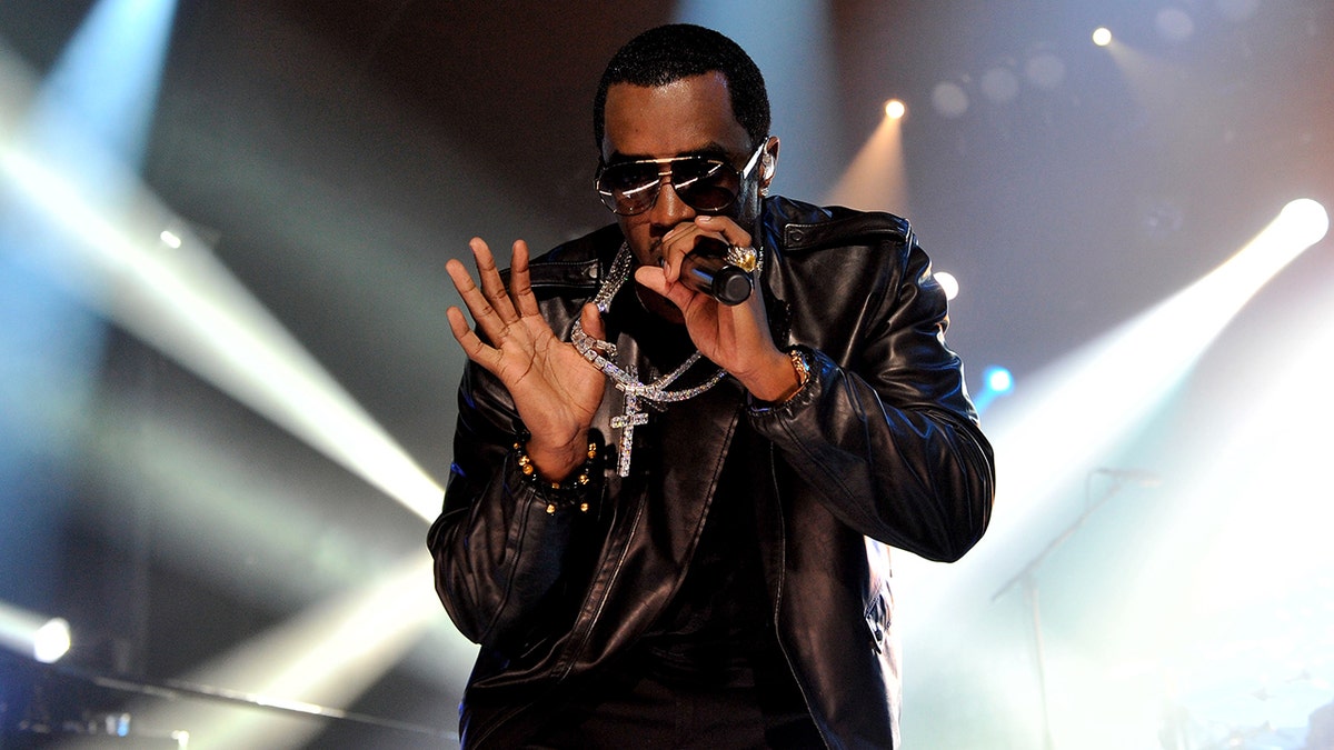Diddy raps on stage