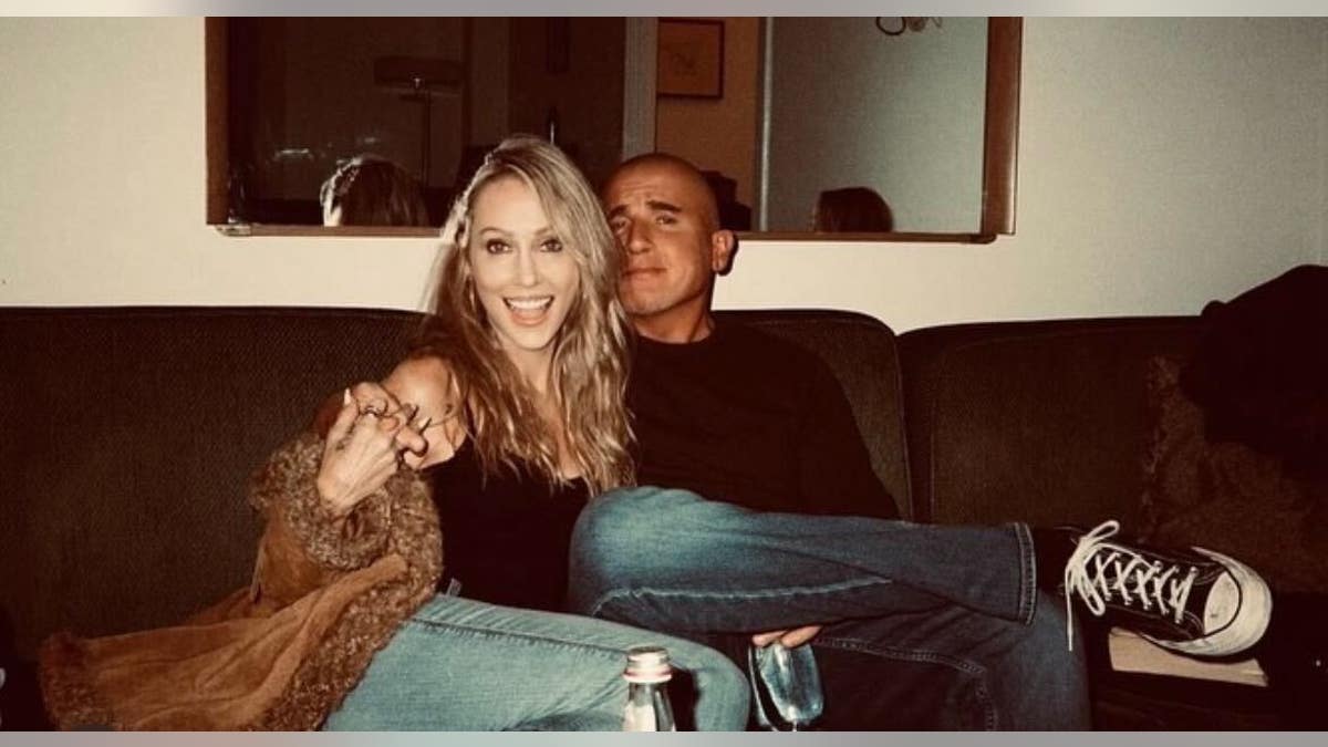 tish cyrus with husband dominic purcell