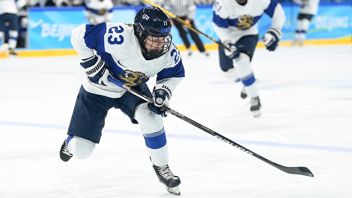 Olympic hockey star Sanni Hakala paralyzed after collision 1 Sanni Hakala carries the hockey puck
