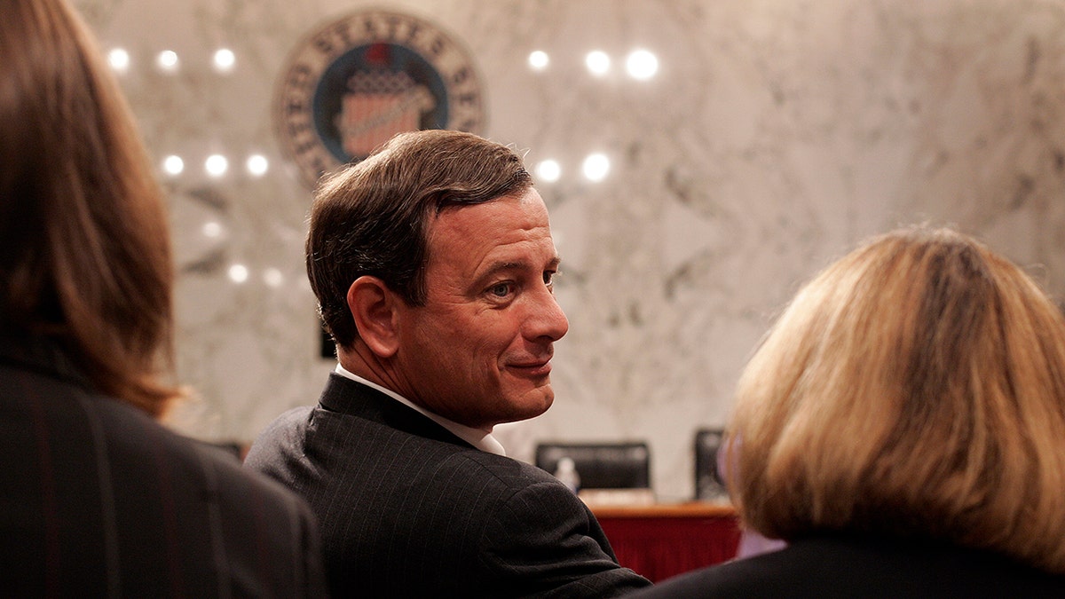 John Roberts looks to his side during confirmation hearing