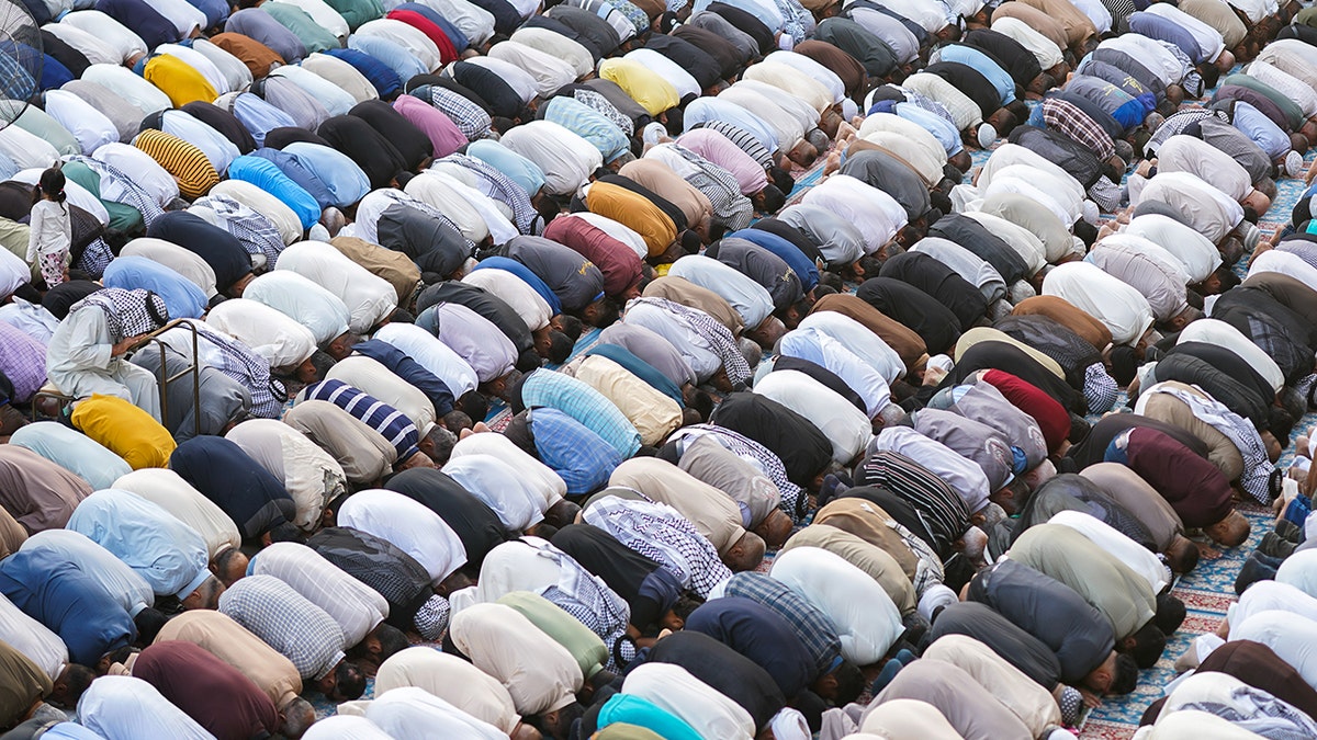 Muslim people praying during the monthlong Ramadan